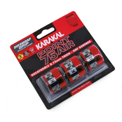 Six packages of Karakal Point 75 Air over grips for tennis rackets, displayed in two rows. The grips come in red, yellow, white, and blue colors, and are shown with and without the protective outer packaging.